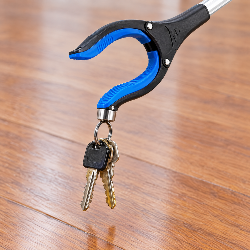 The EasyReach magnetic tip lifting a set of keys off the floor